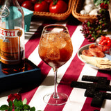 Campo de' Fiori cocktail with rosehip berry cordial, lemon sparkling water, citrus bitters, and a rose water spritz
