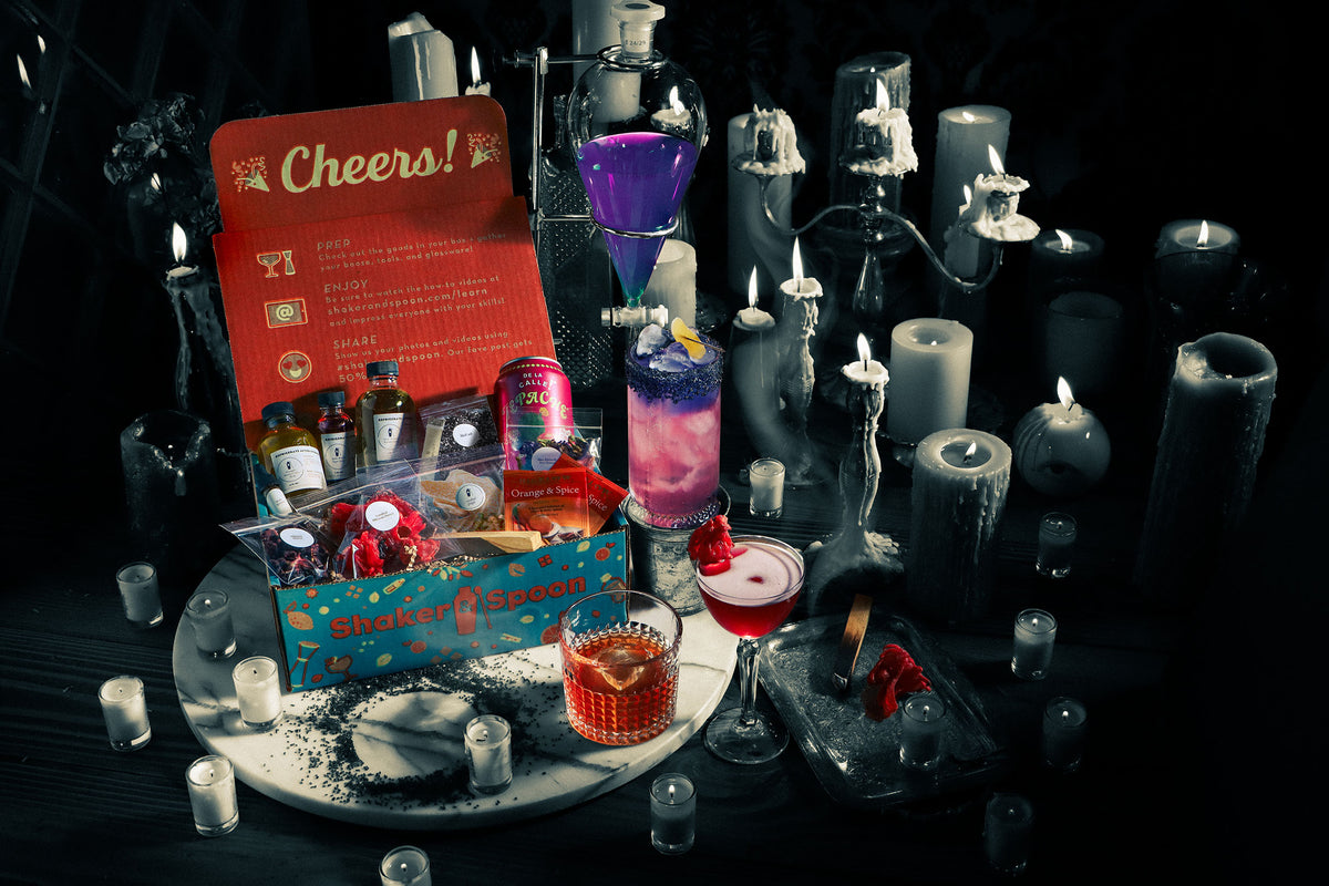 Craft cocktail box with artisan syrups and a finished cocktail